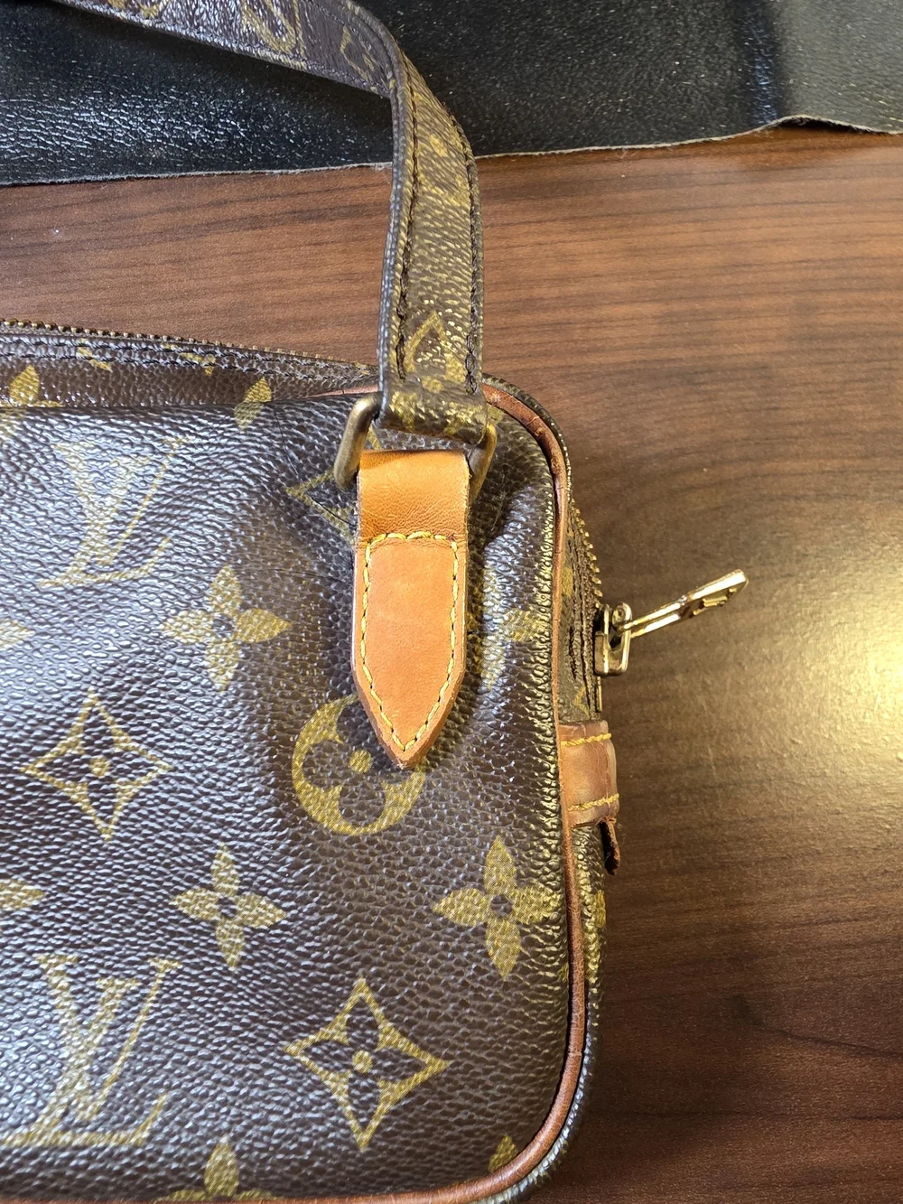 Vintage (1990) Louis Vuitton Marly Bandoulière in Monogram coated canvas.